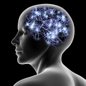 A head in silhouette showing the synapses in the brain
